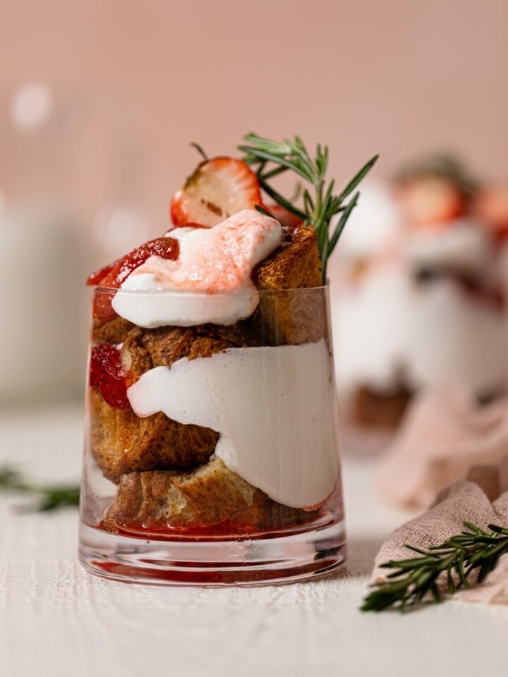 Glass overflowing with a Dairy-Free Strawberry French Toast Trifle