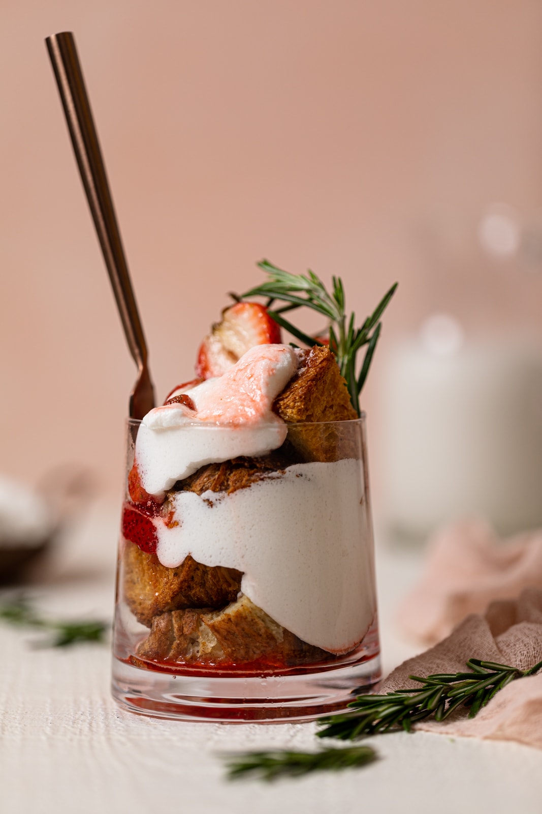 Spoon dipping into a Dairy-Free Strawberry French Toast Trifle