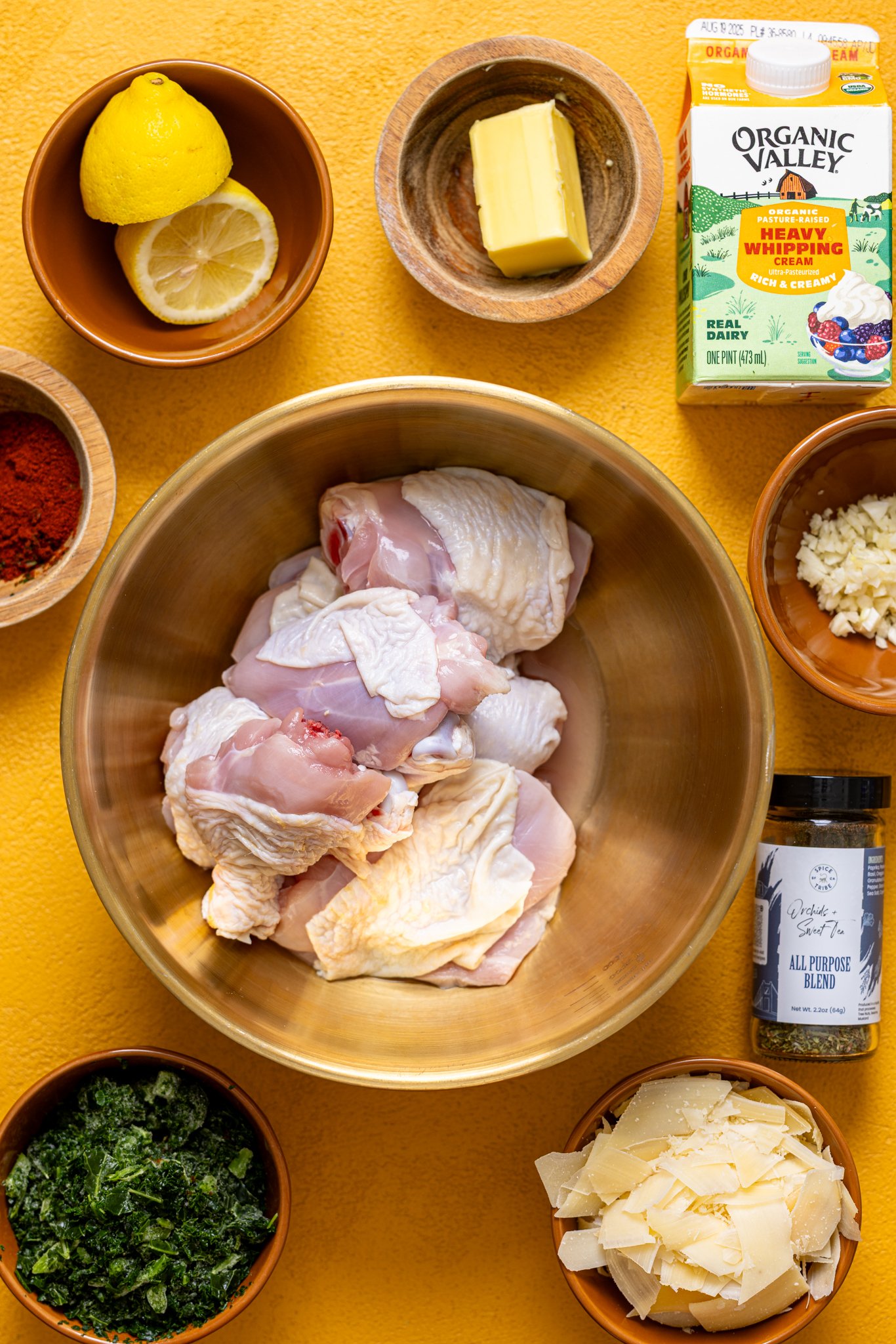 Ingredients on a yellow table.
