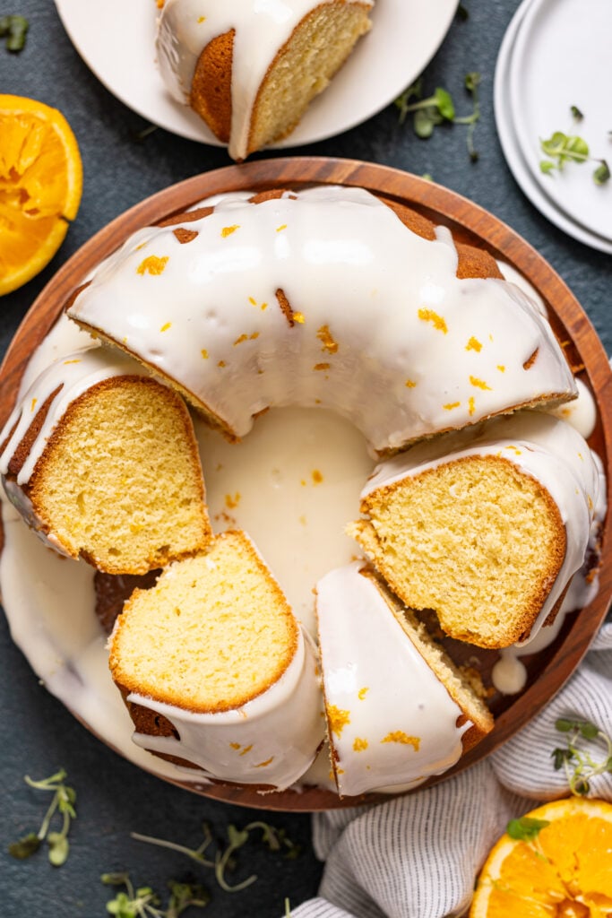 Up close shot of Orange Olive Oil Bundt Cake with slices.