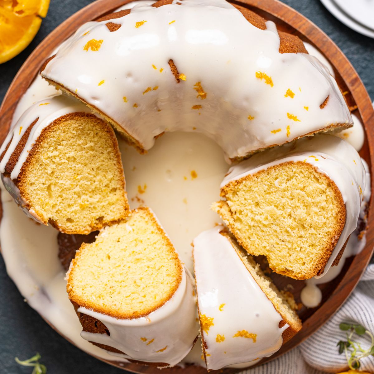 Up close shot of Orange Olive Oil Bundt Cake with slices.