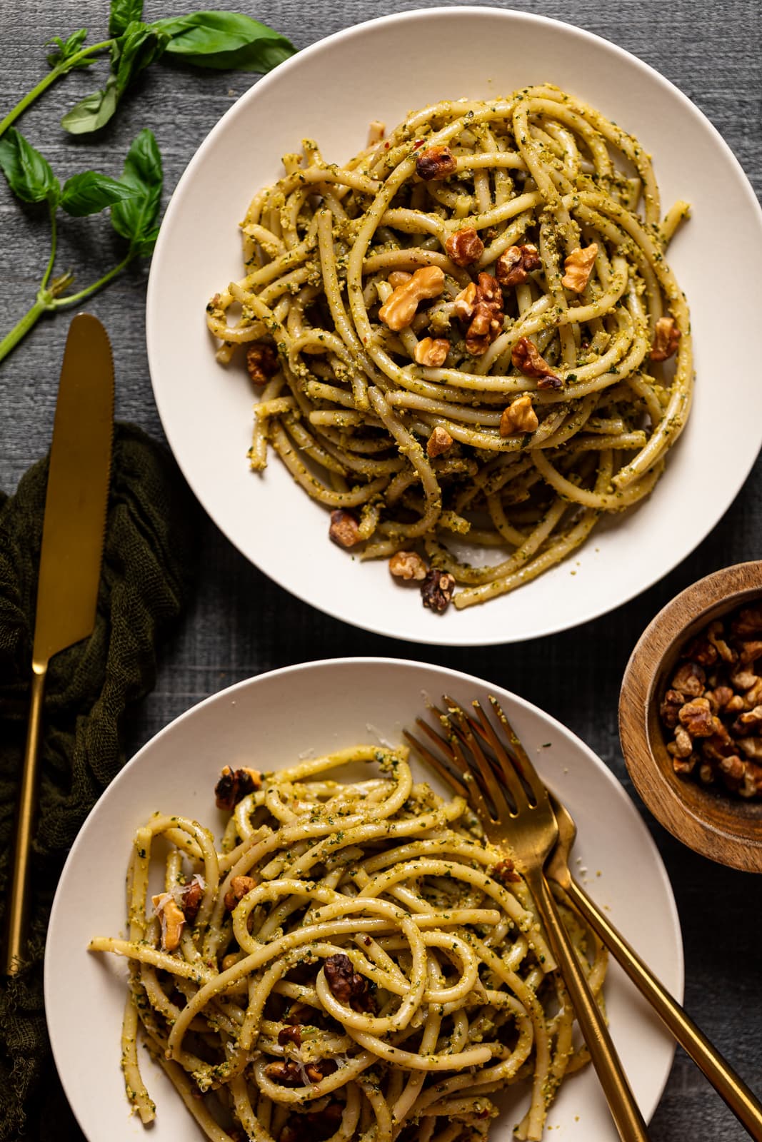 Two plates of Walnut Pesto Bucatini Pasta