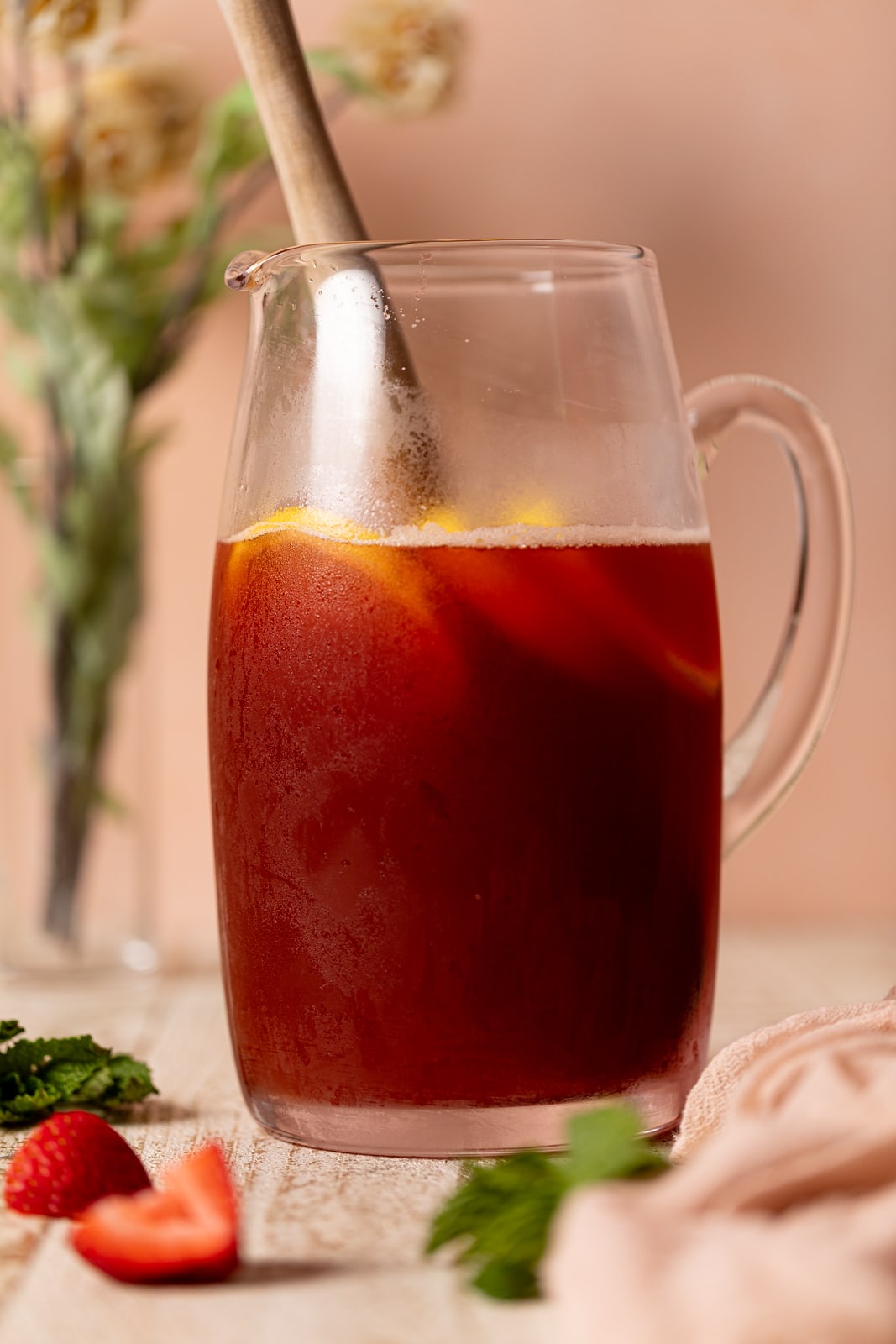 Glass pitcher of Southern Strawberry Iced Sweet Tea