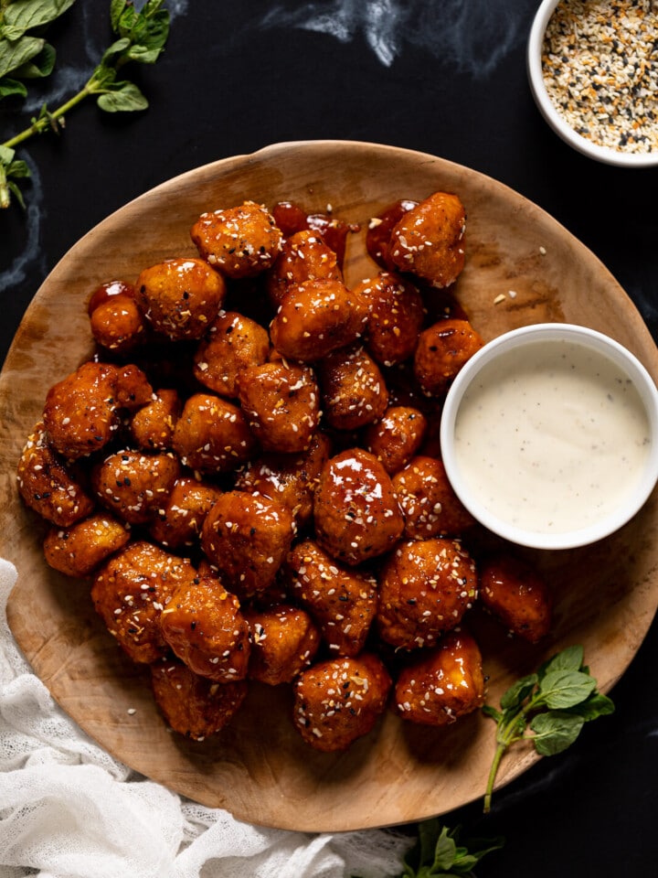 Plate of Everything Bagel Cauliflower Bites with a bowl of dip