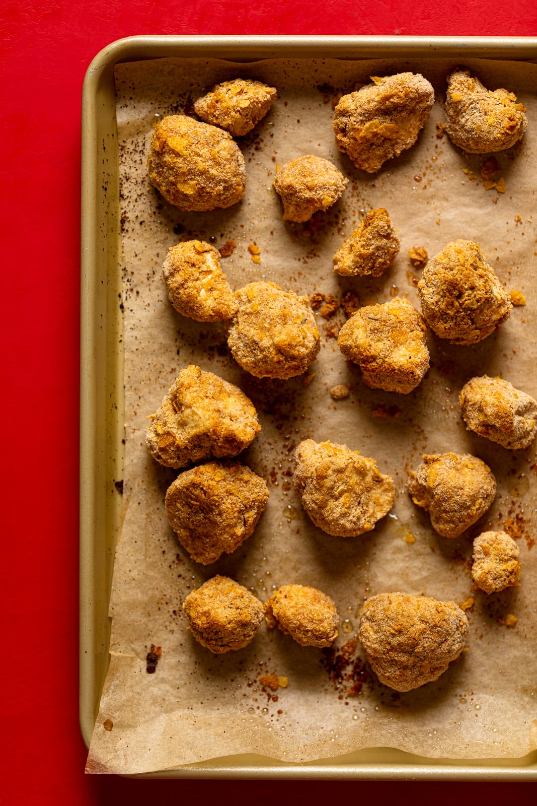 Breaded cauliflower on a baking sheet