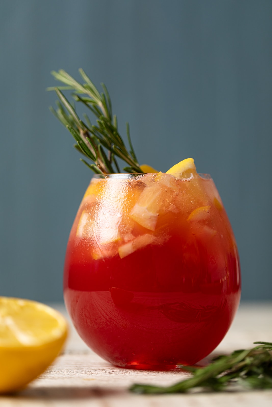 Closeup of a glass of Cranberry Lemon Spritzer with Lemonade Ice Cubes