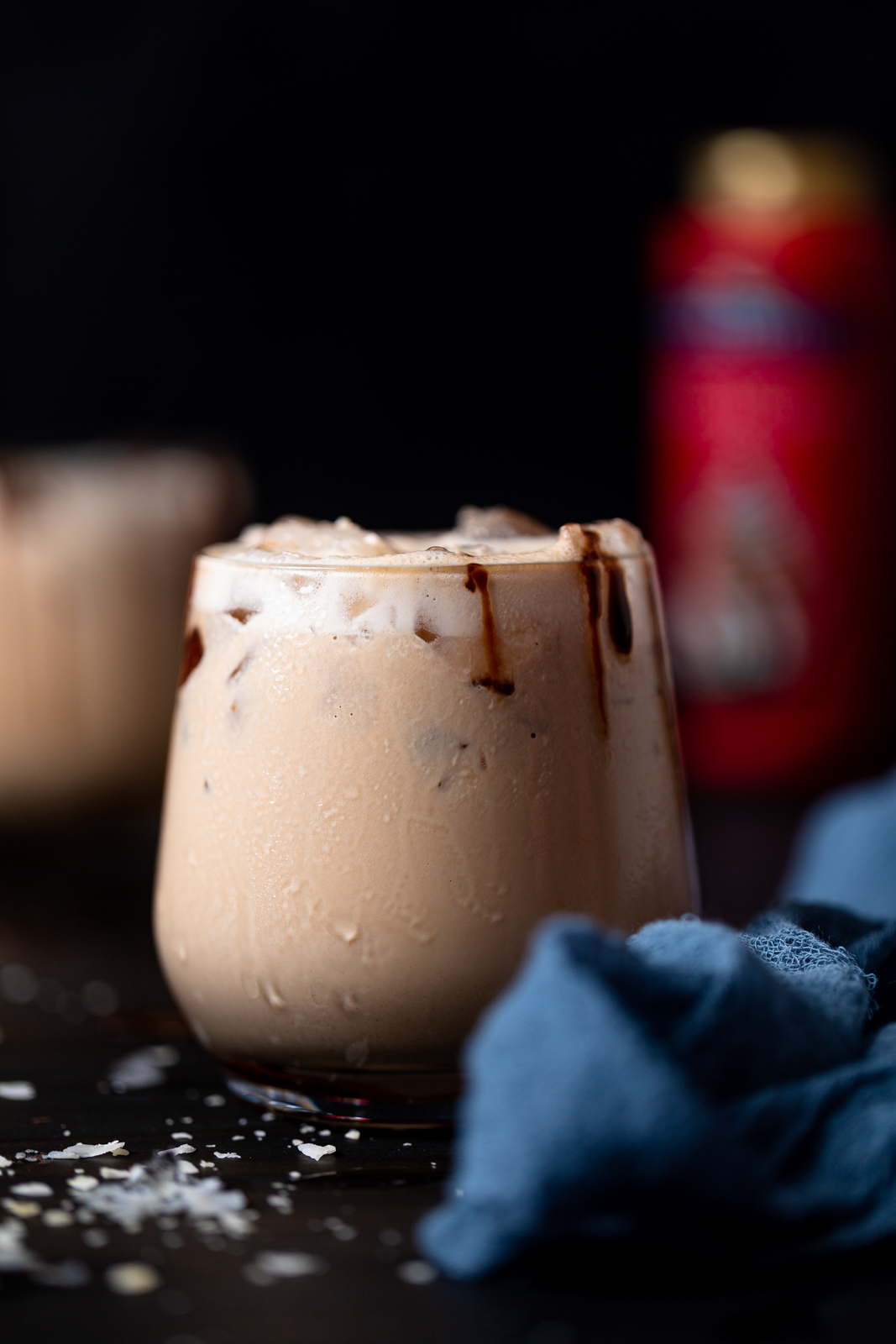 Glass of alcohol-free Jamaican Rum Cream with chocolate dripping down the side