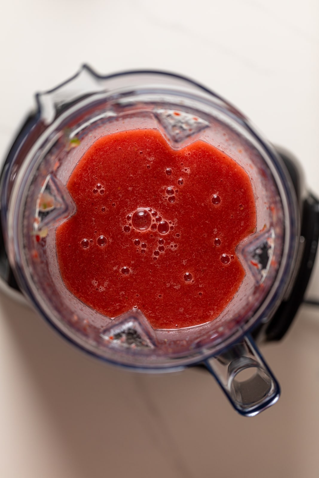 Frozen Cucumber Watermelon Strawberry Mocktail mix in a blender
