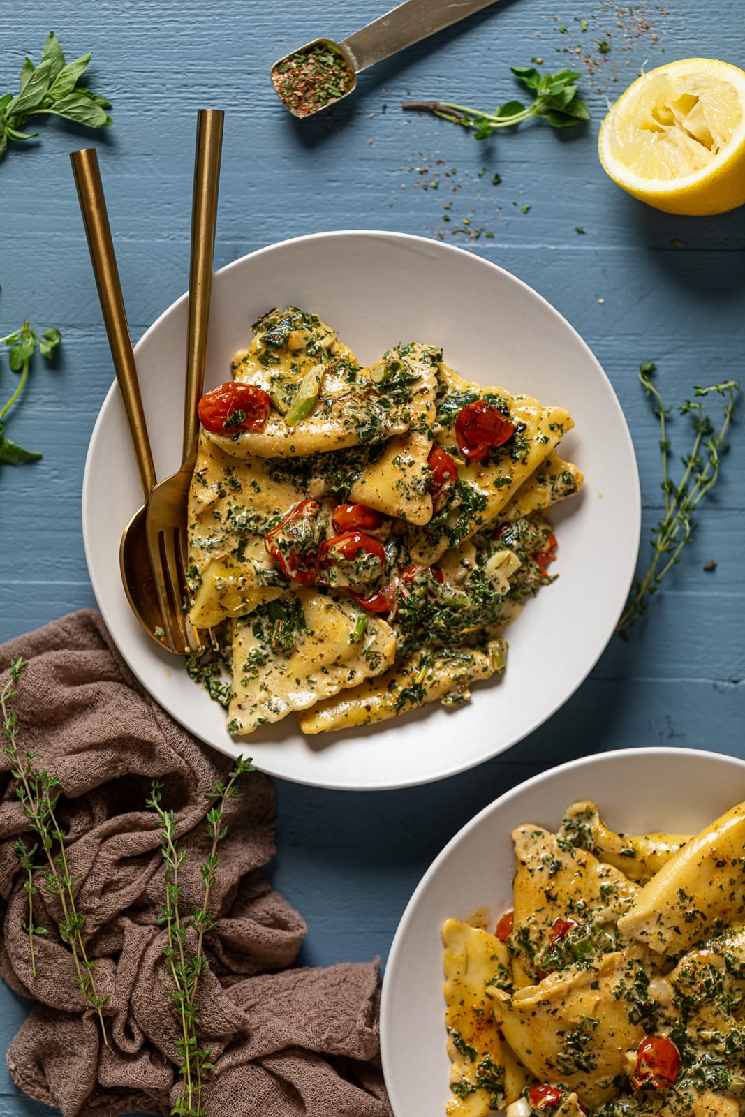 Two plates of Creamy Tuscan Ravioli