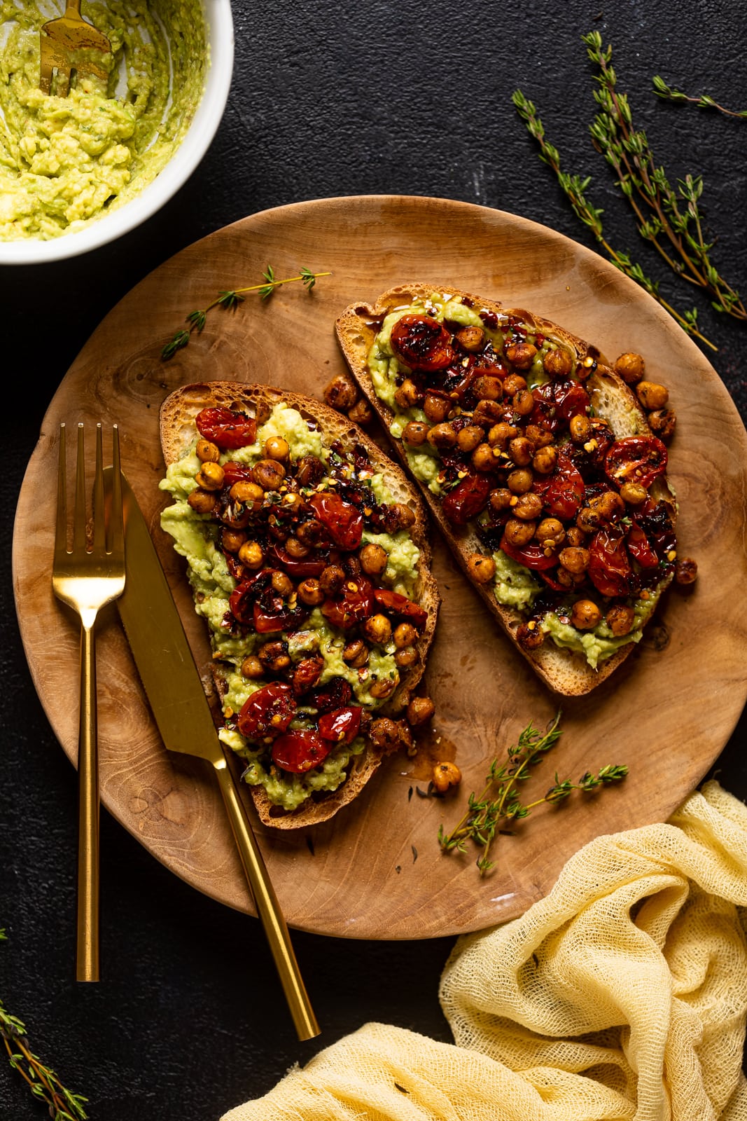 Overhead shot of a plate with two pieces of Avocado Toast