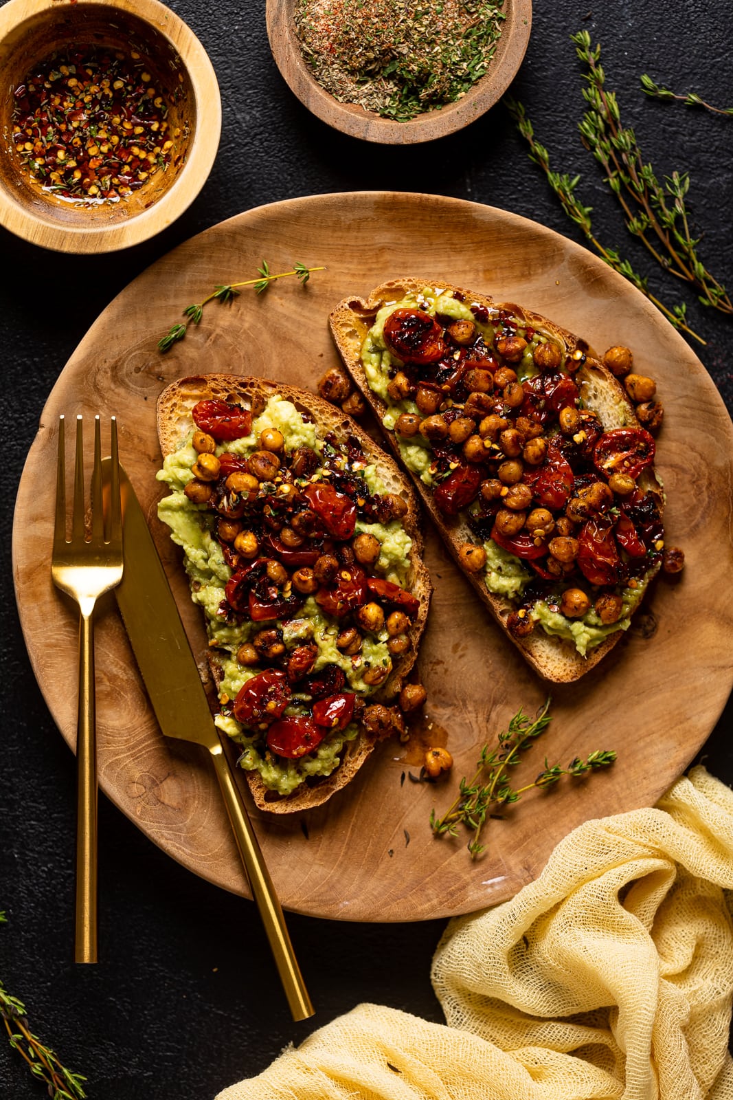 Overhead shot of a plate with two pieces of bread.