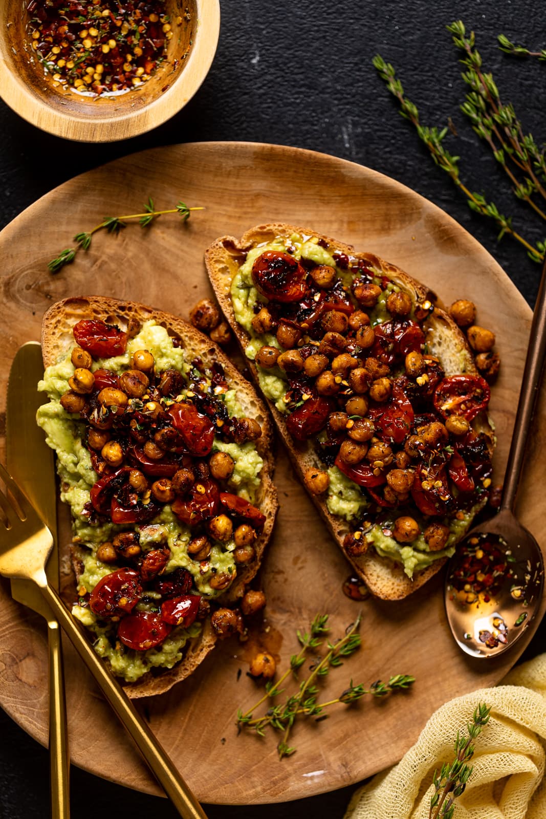 Plate with two pieces of Avocado Toast and silverware