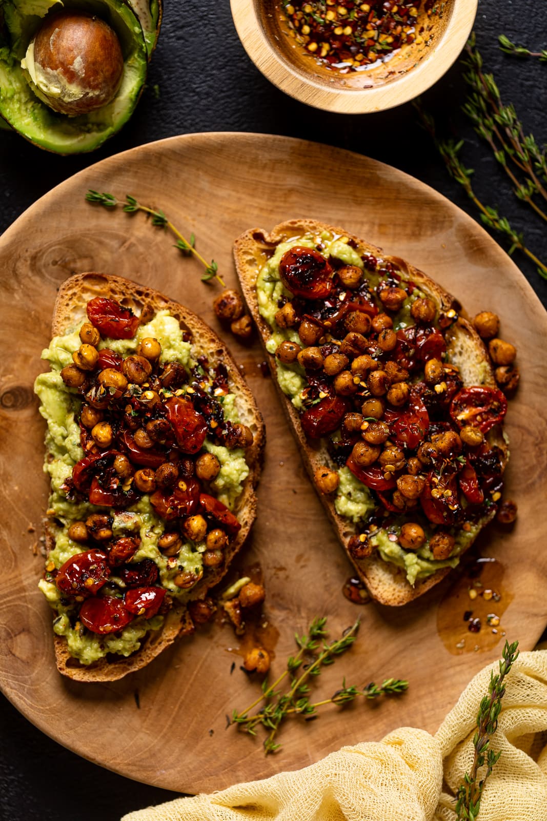 Closeup of a plate with two pieces of Avocado Toast