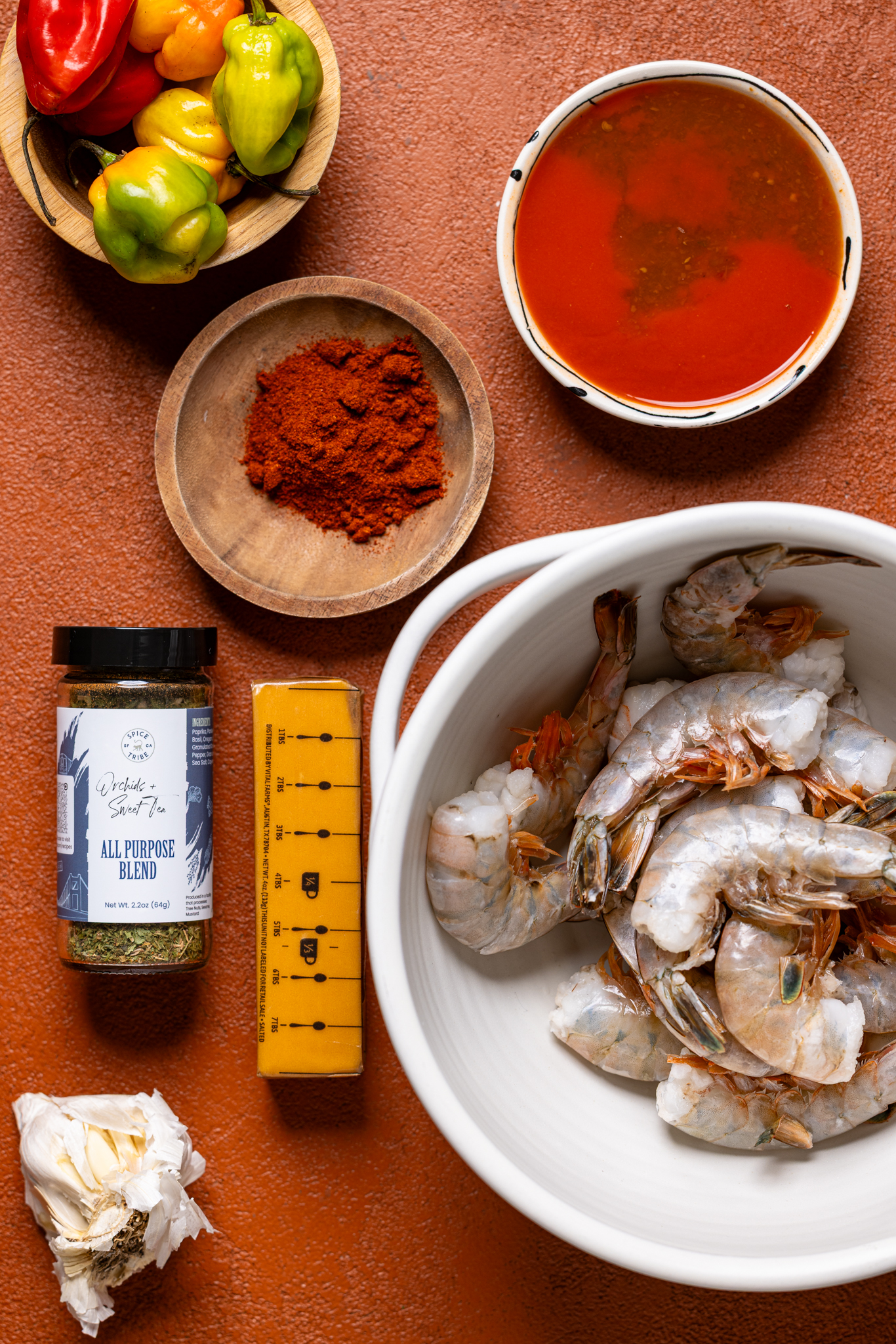 Ingredients on burnt orange table.