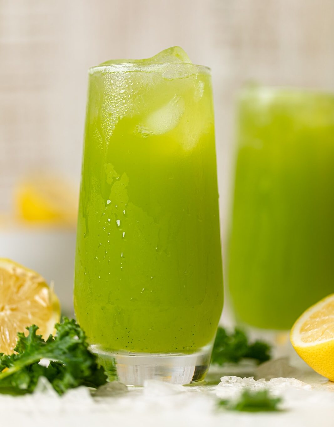 Two glasses of bright green Kale Lemonade