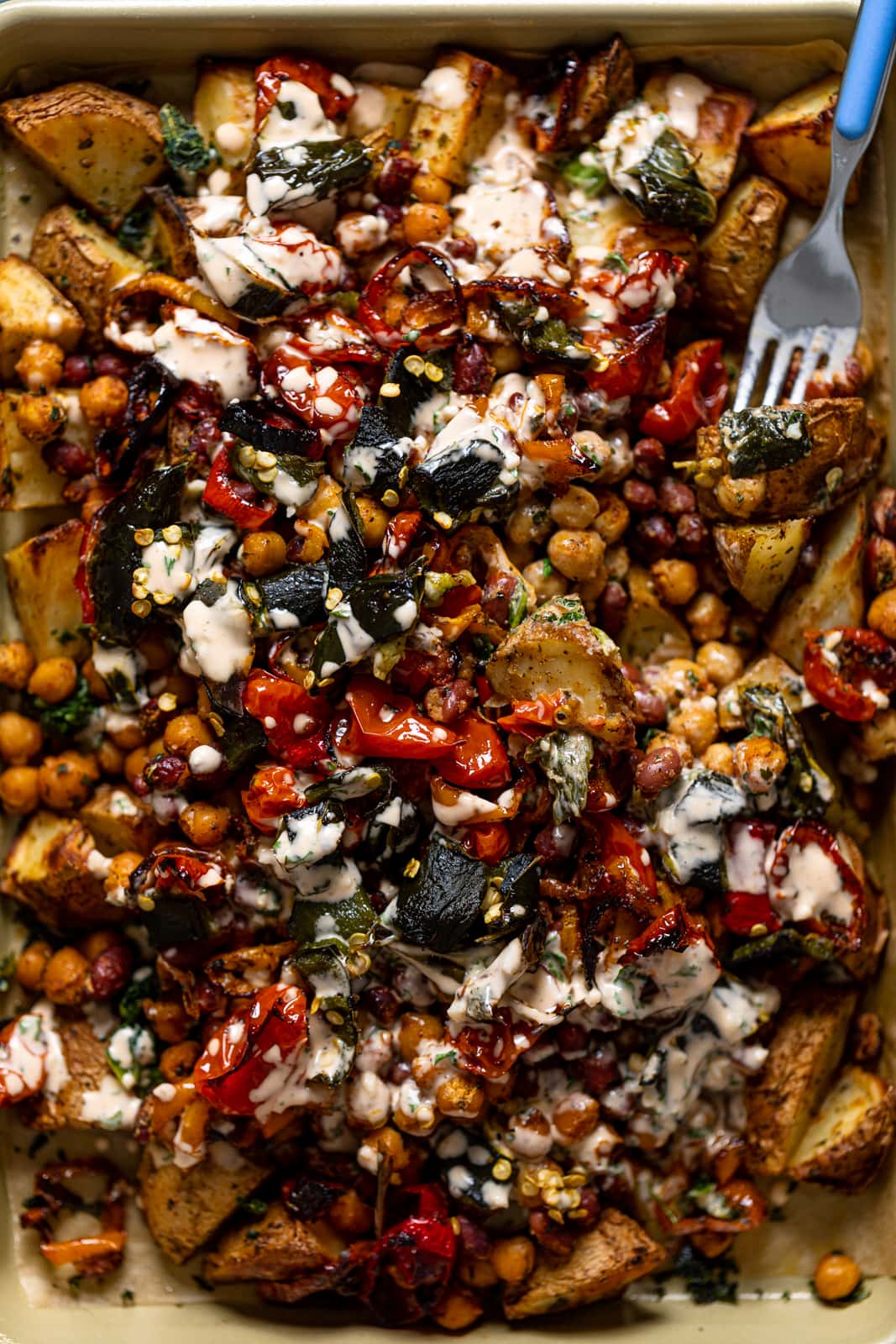 Closeup of Loaded Potatoes with Spicy Beans