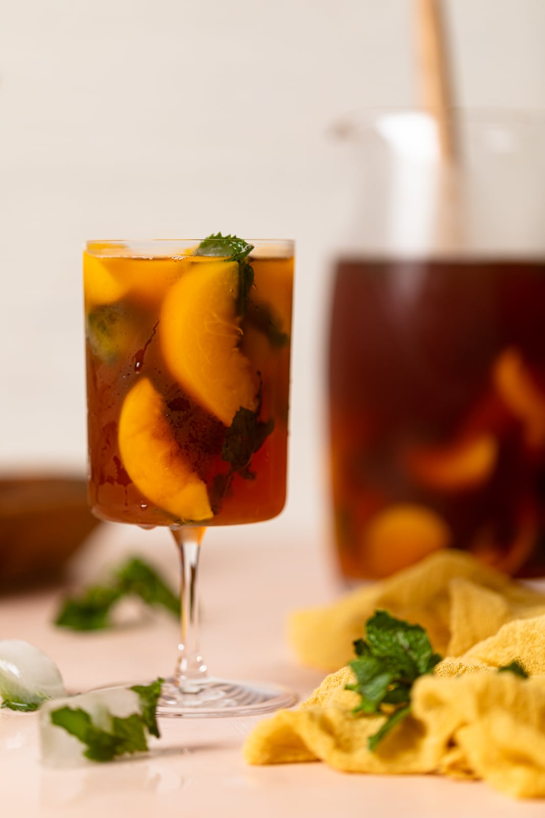 Glass and pitcher of Southern Peach Iced Tea