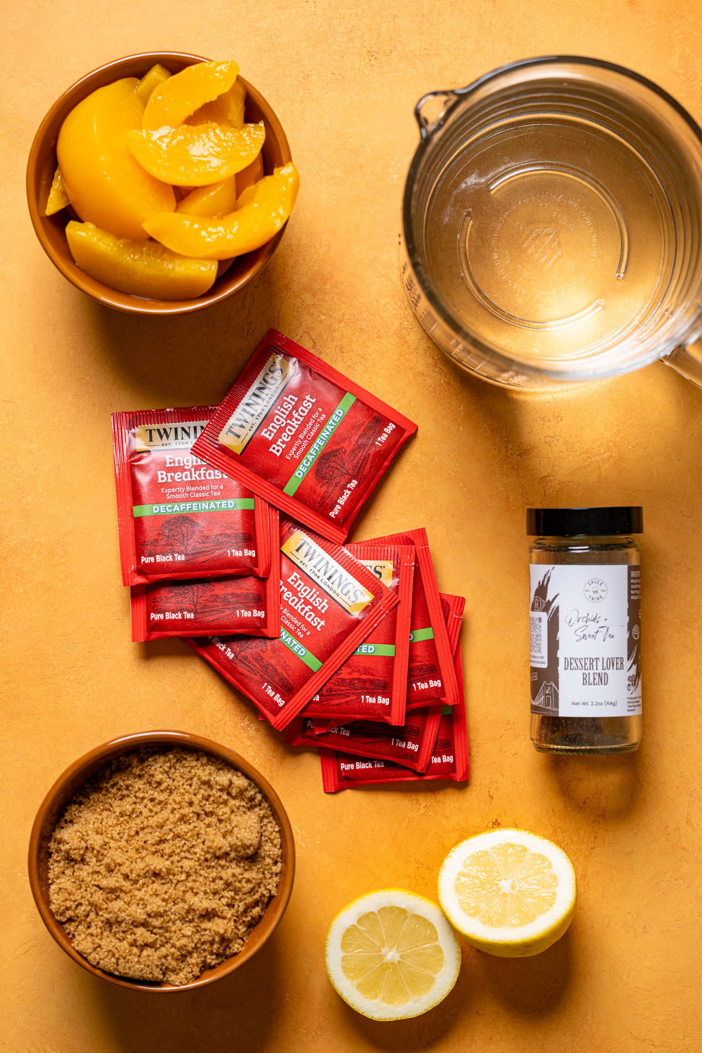 Ingredients on a yellow table.