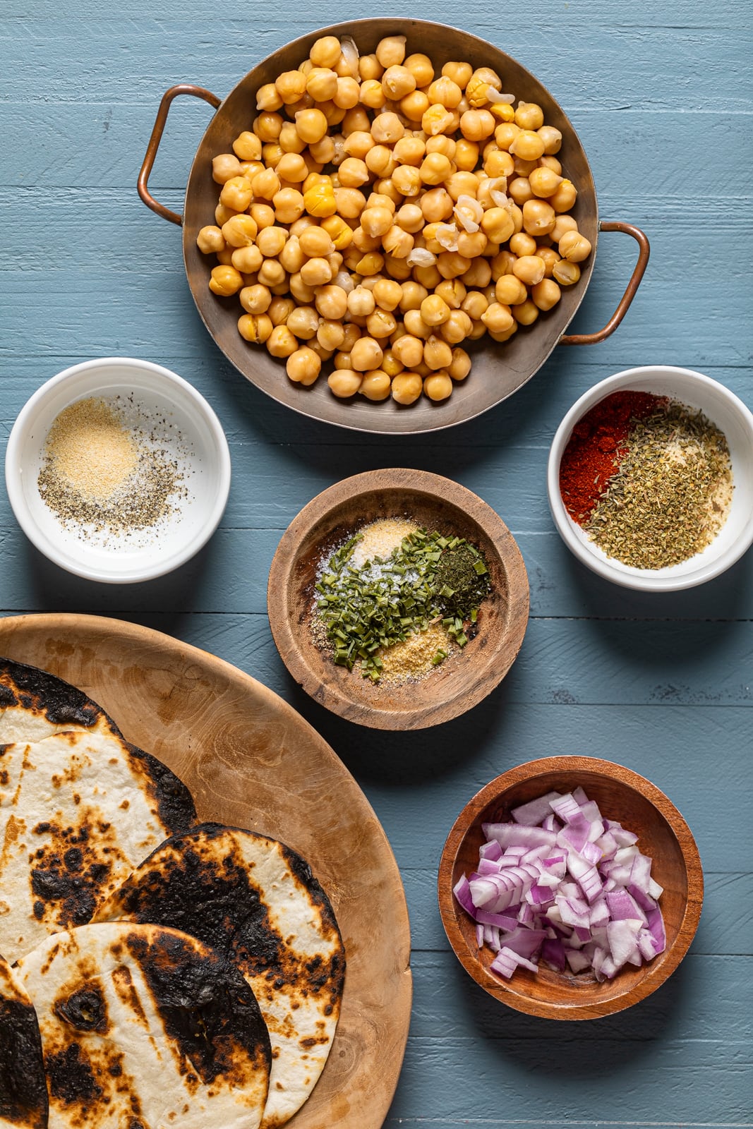 Ingredients for Summer Vegan Tacos including chickpeas, seasonings, and tortillas