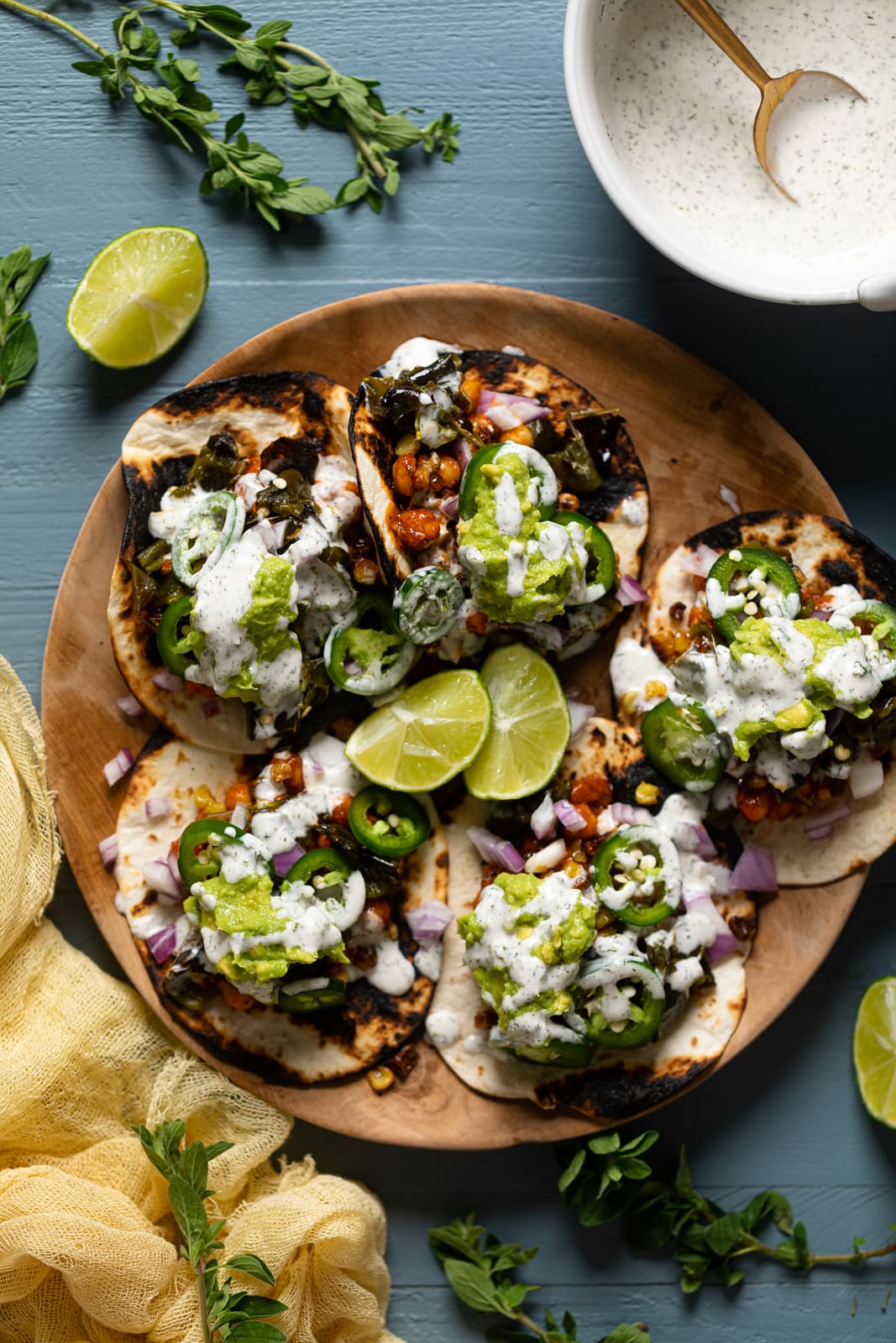 Plate of Summer Vegan Tacos with lime wedges