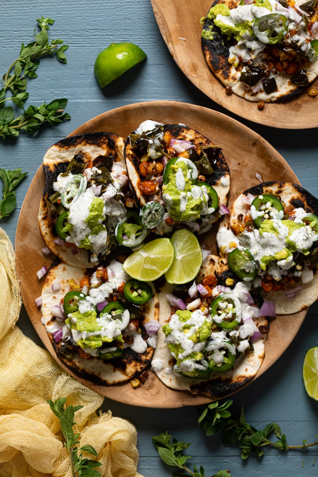 Plate of Summer Vegan Tacos with lime wedges