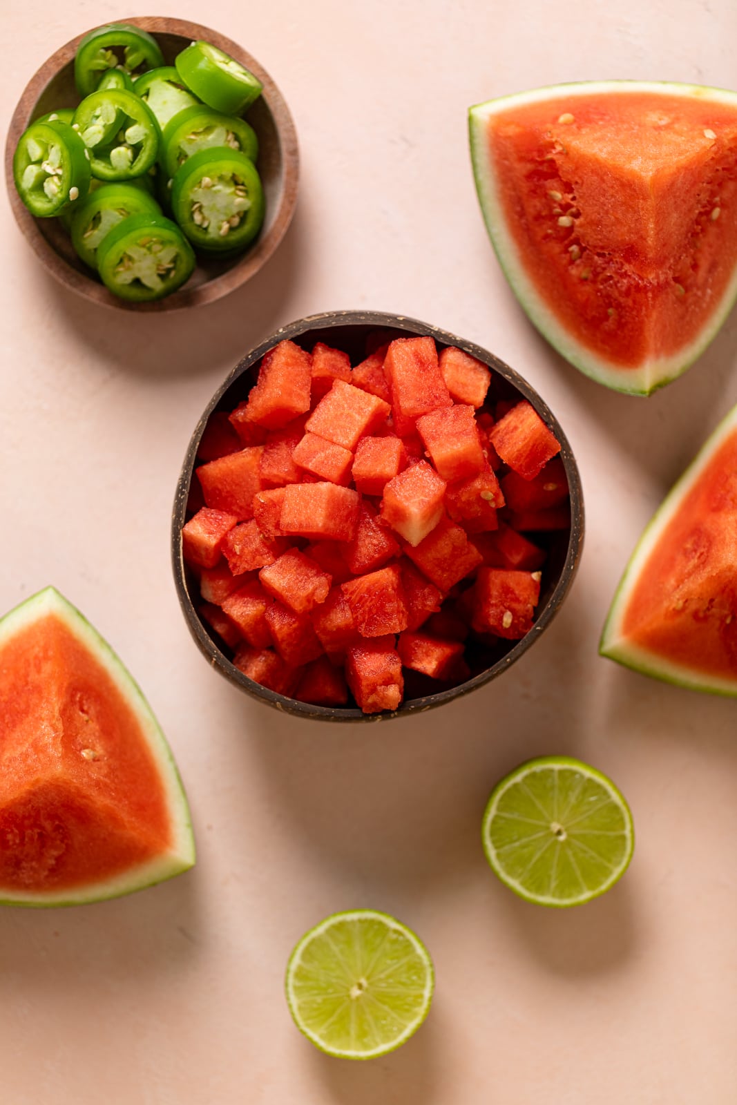 Ingredients for Spicy Watermelon Mojito Mocktail including jalapeno, watermelon, and lime