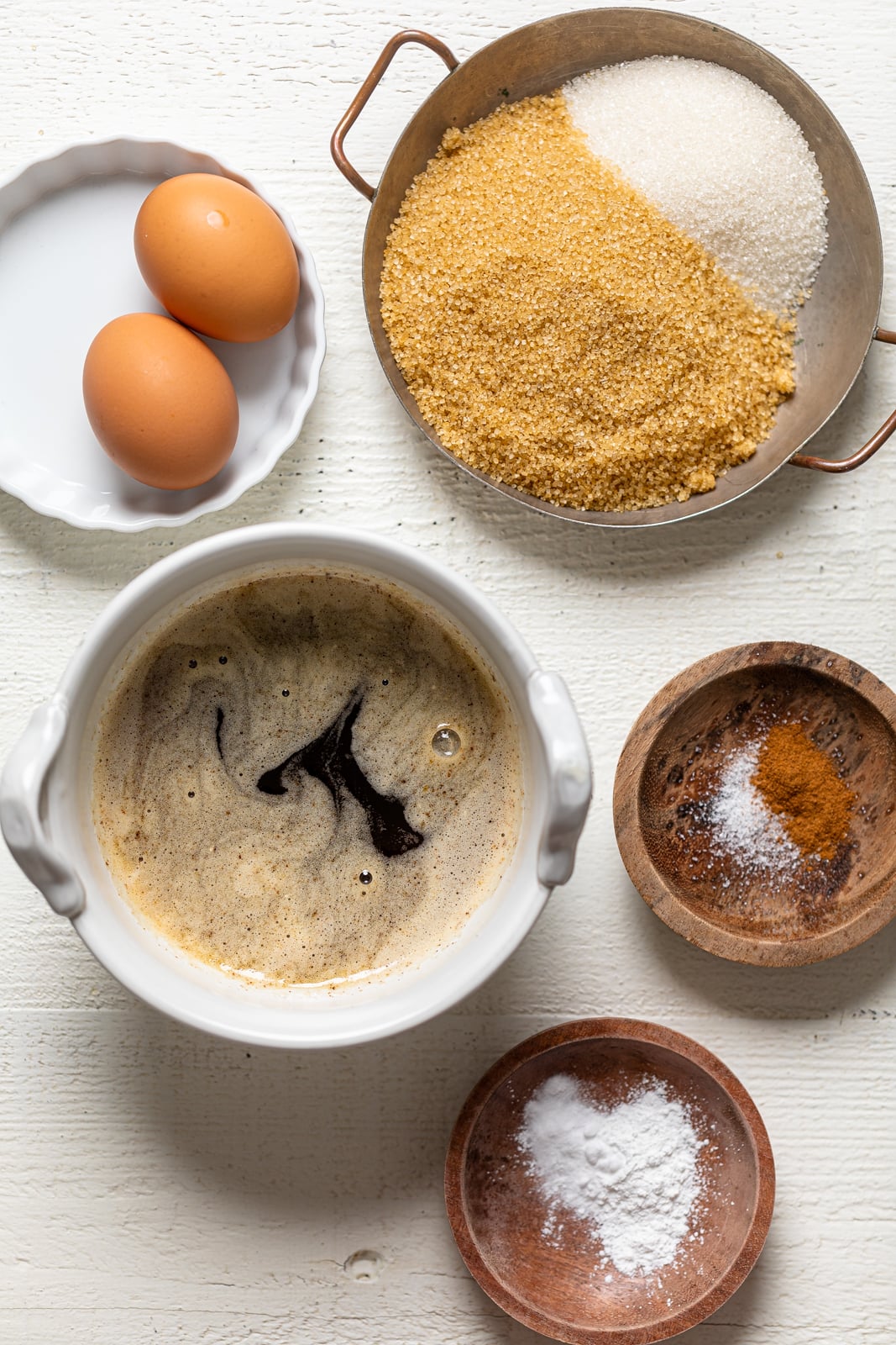 Ingredients for Chocolate Stuffed Butter Pecan Cookies including eggs, sugar, and seasonings