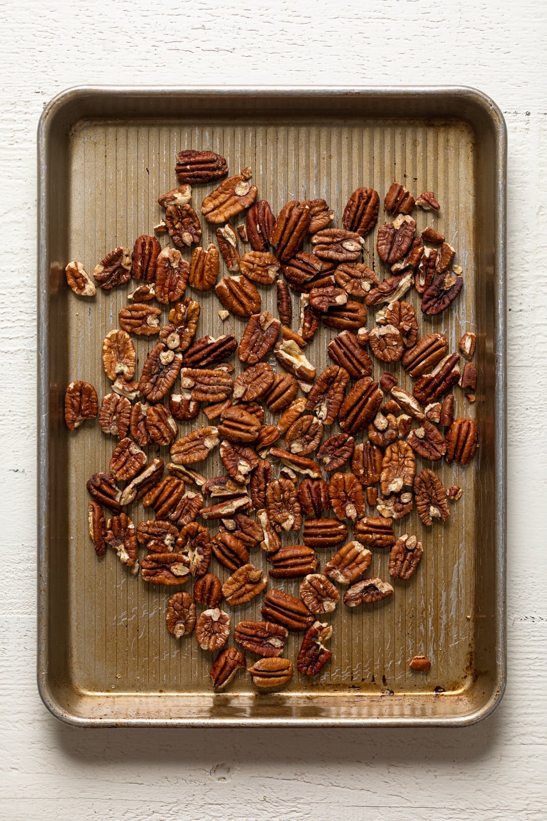 Pecans on a baking sheet