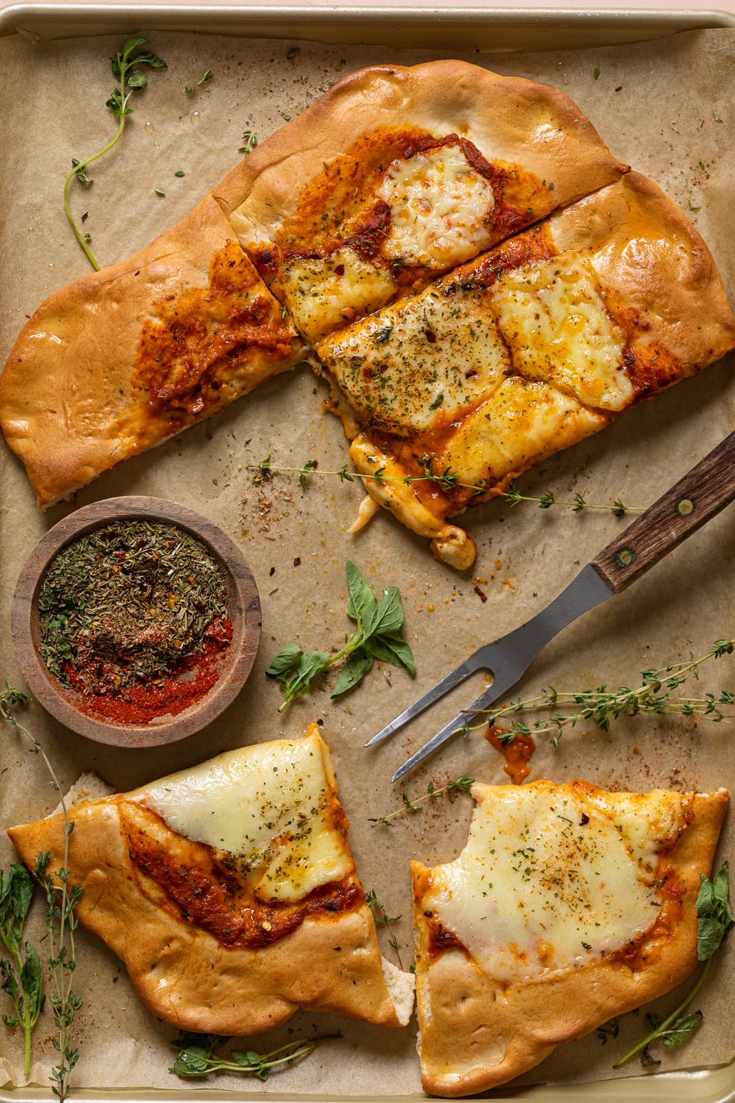 Half-eaten Cheese Sheet Pan Pizza