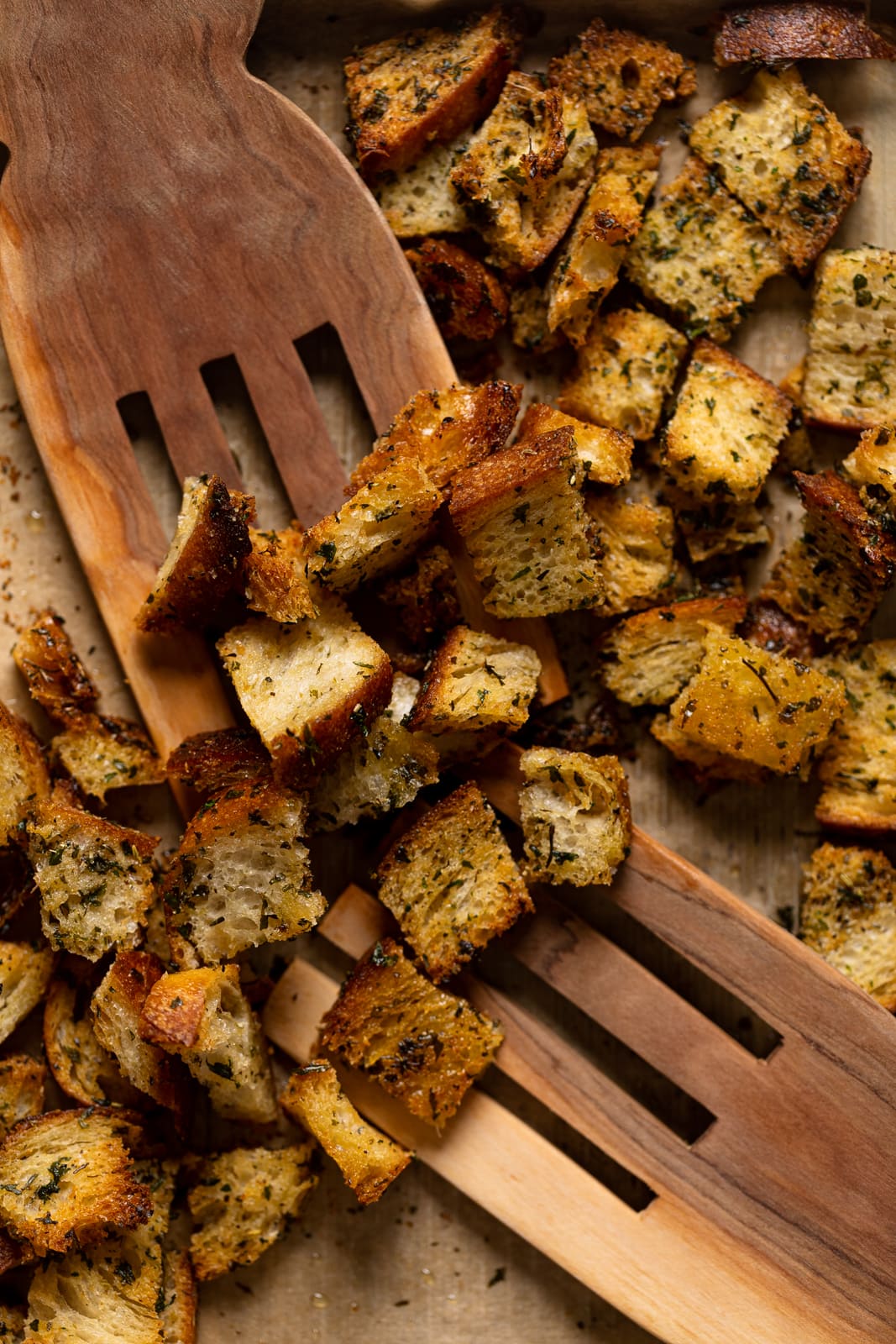 Wooden salad tossers with homemade croutons