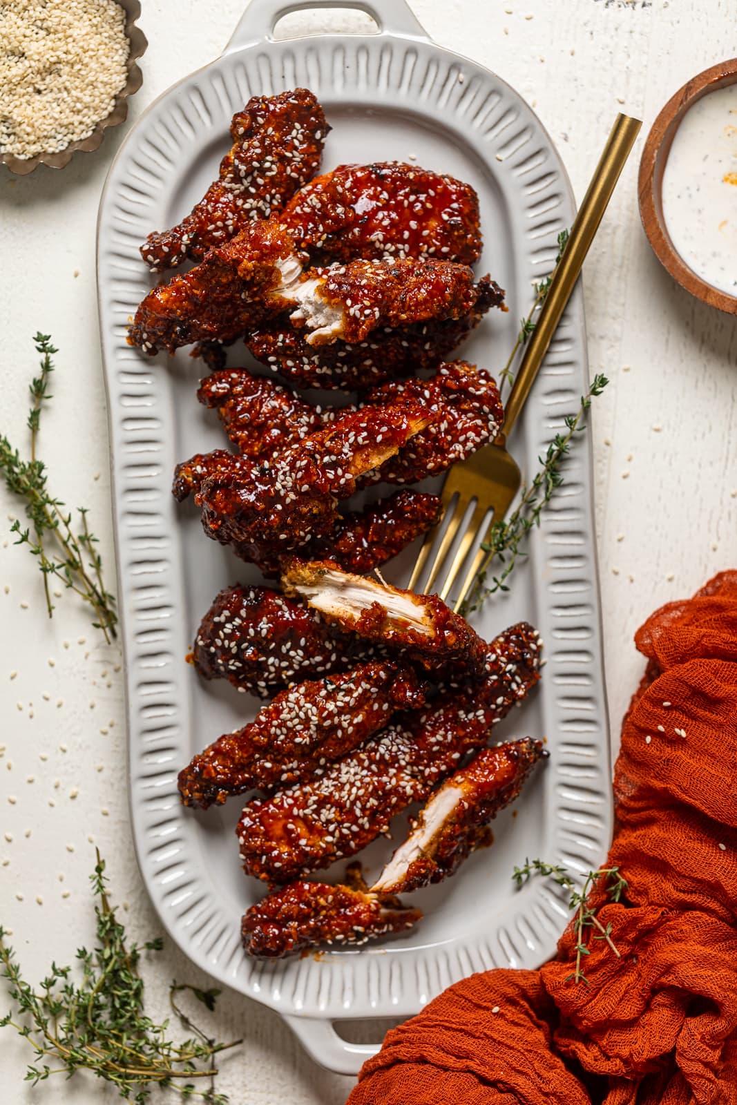 Overhead shot of a platter of Spicy Gochujang Chicken Tenders