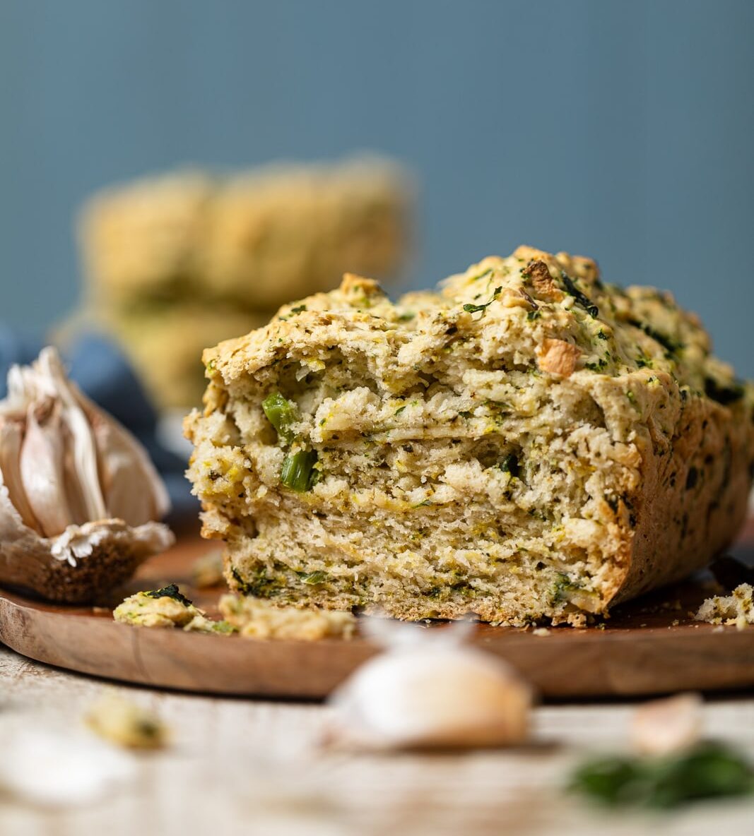 Vegan Garlic Herb Kale Bread on a wooden plate