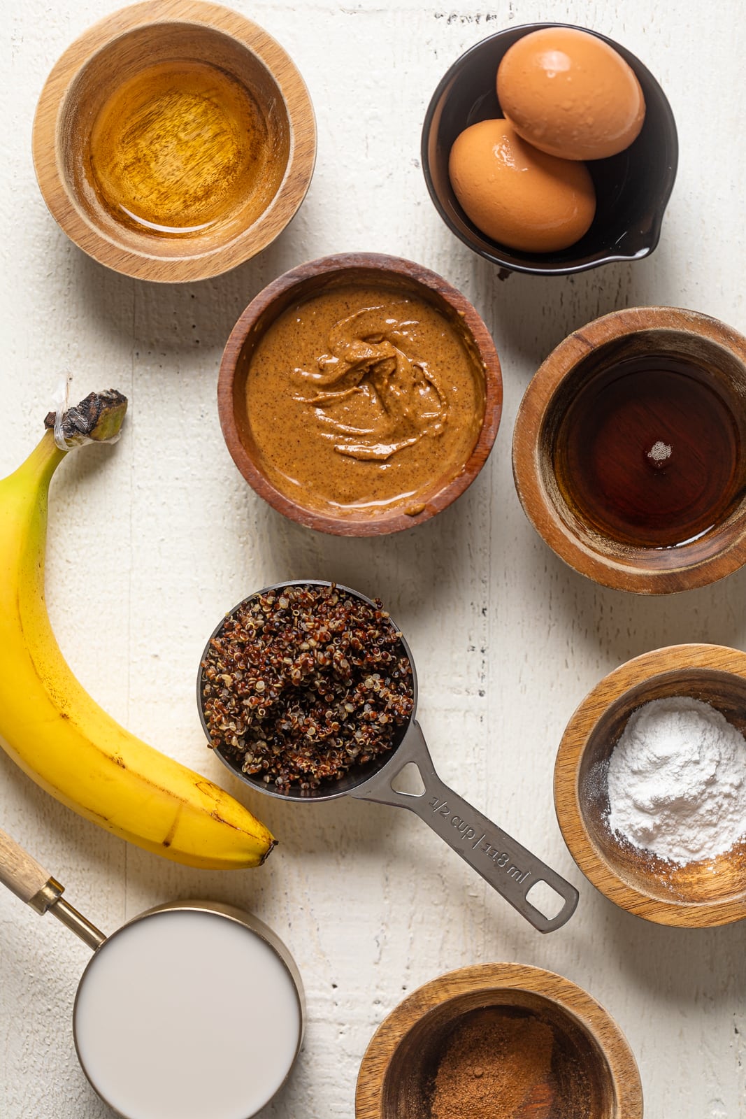 Ingredients for Fluffy Protein Pancakes including banana, egg, and almond butter