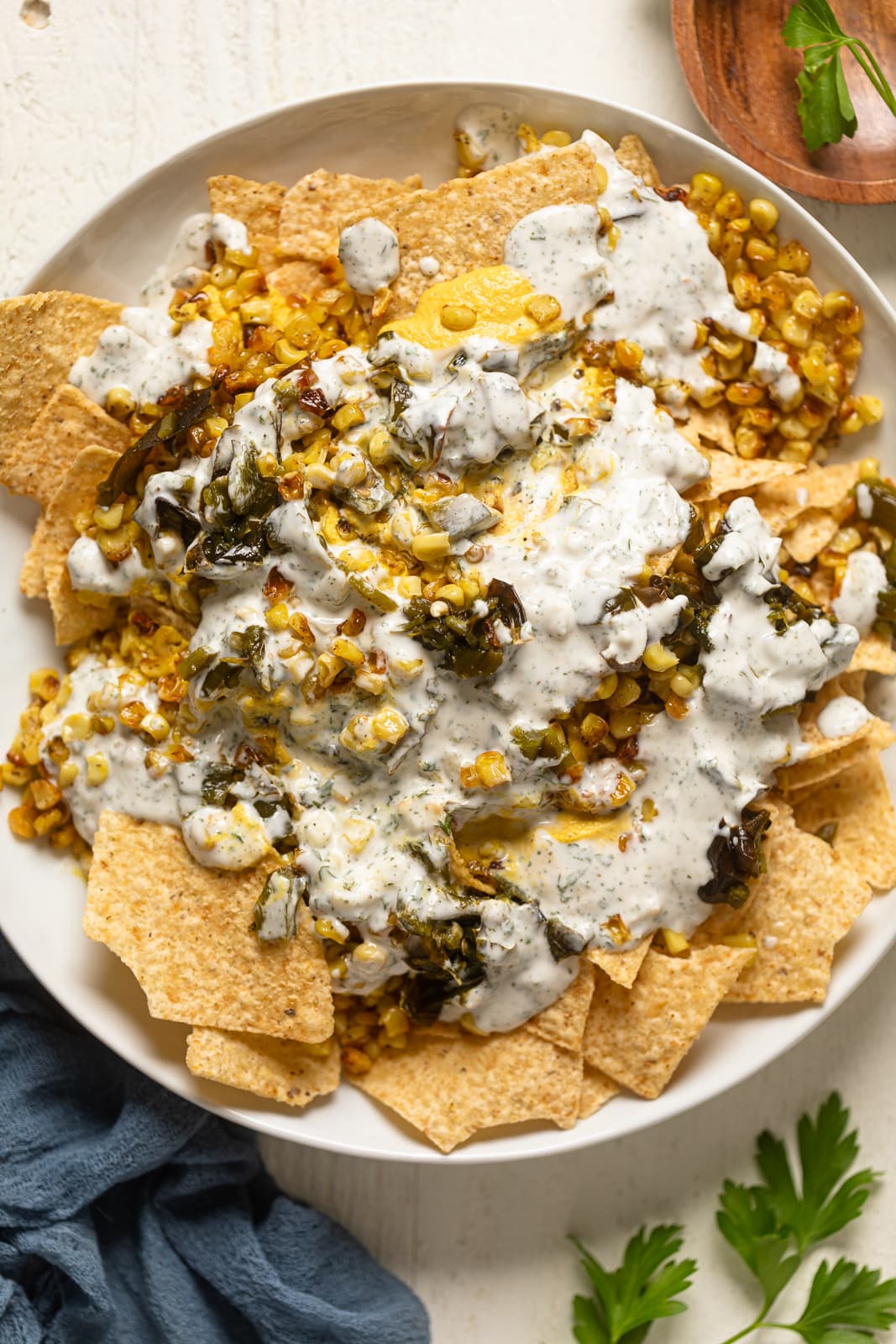 Closeup of a plate of Dairy-Free Mexican Street Corn Nachos