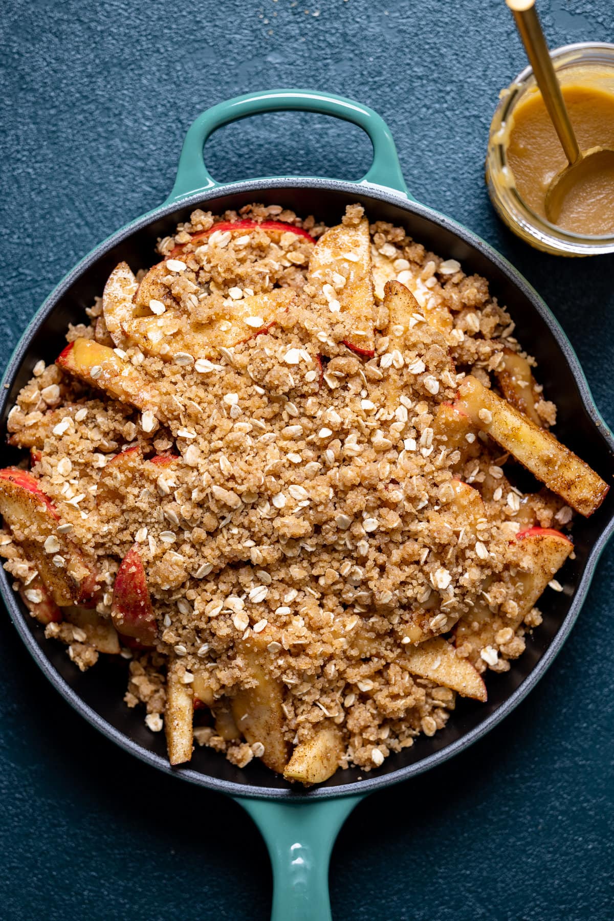 Uncooked Salted Caramel Apple Crisp in a skillet