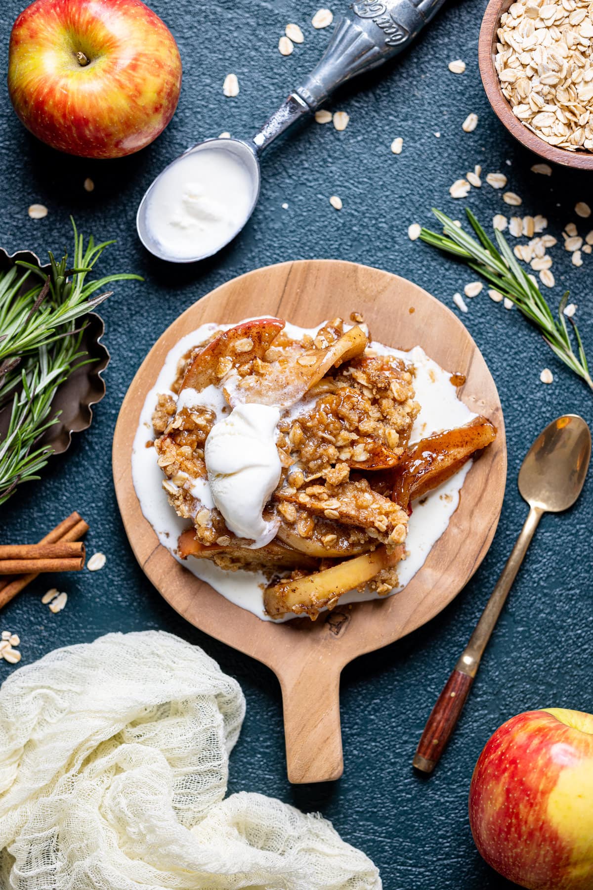 Salted Caramel Apple Crisp on a wooden serving platter