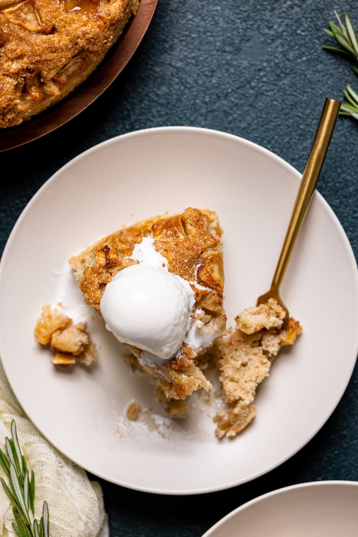 Overhead shot of a slice of Apple Cinnamon Olive Oil Cake