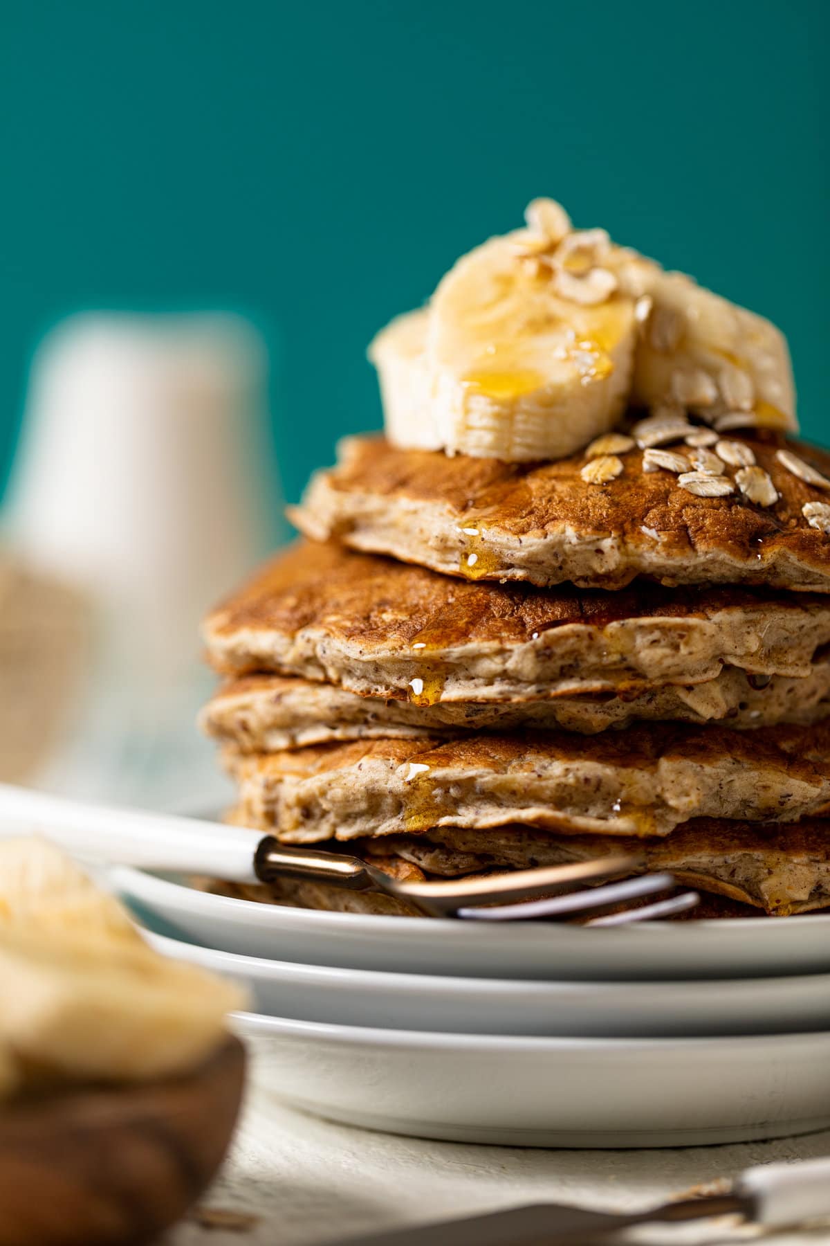 Closeup of a stack of Fluffy Banana Oat Pancakes