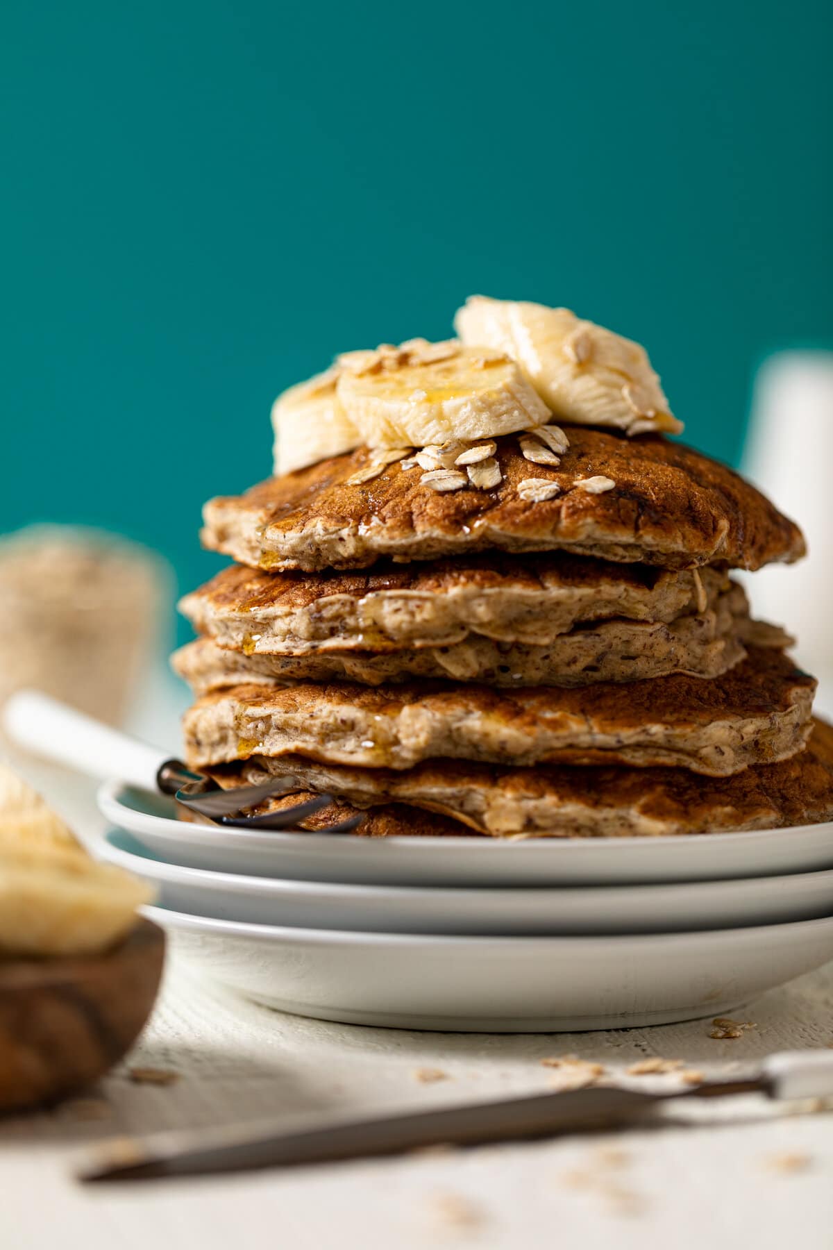 Closeup of a stack of Fluffy Banana Oat Pancakes