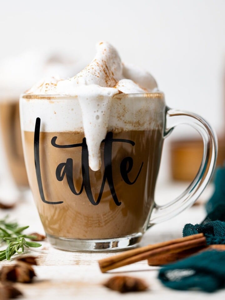 Overflowing glass of Fall Spice Latte