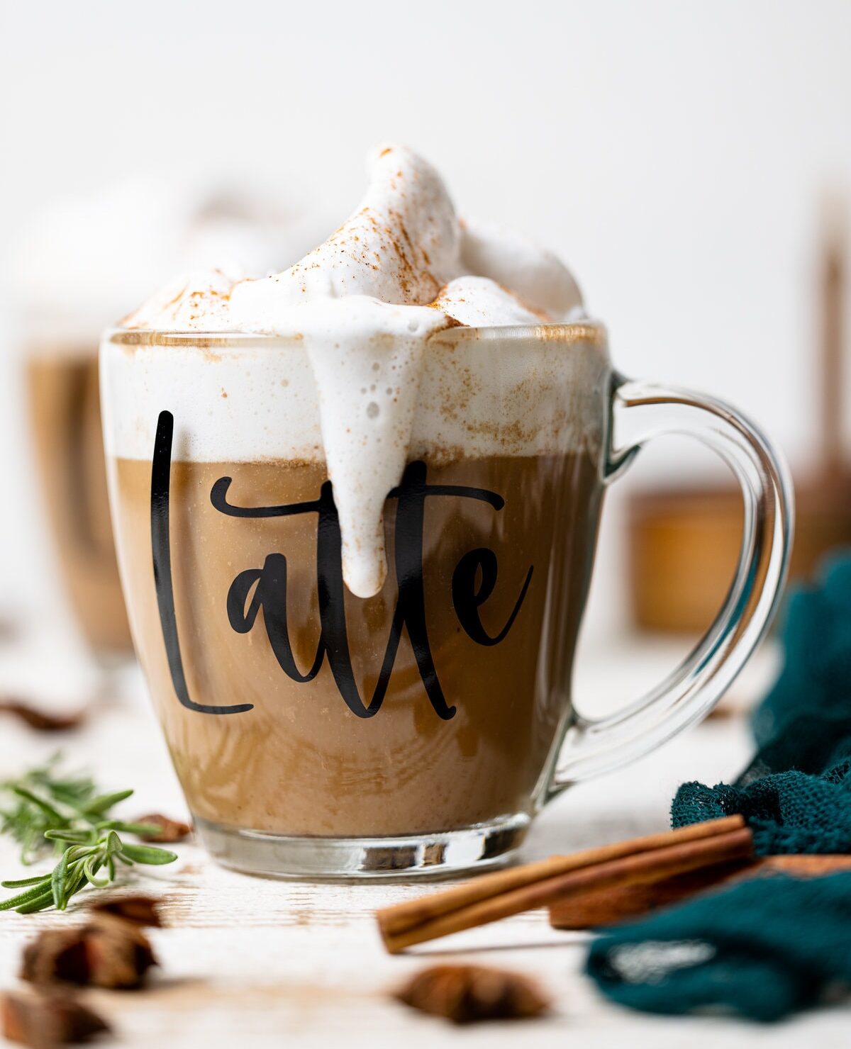 Overflowing glass of Fall Spice Latte