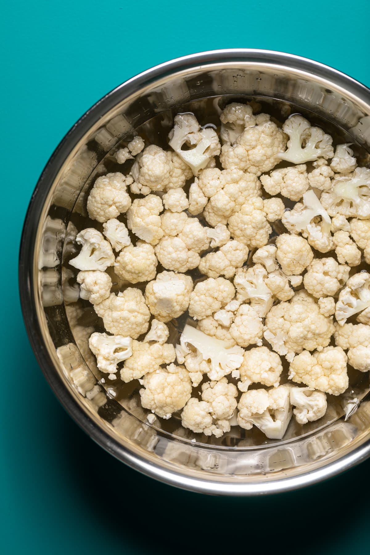 Bowl of chopped cauliflower in water