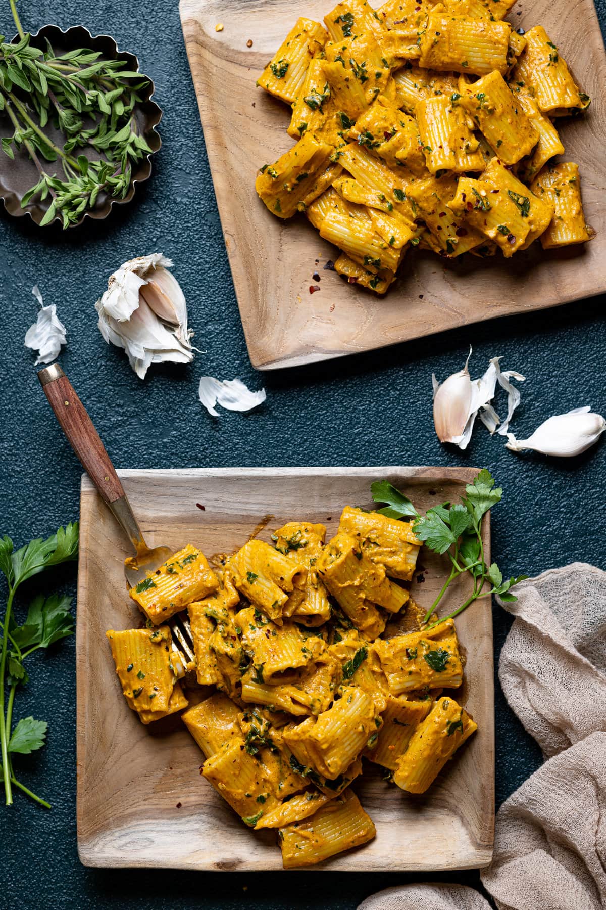 Two plates of Spicy Brown Butter Pumpkin Rigatoni