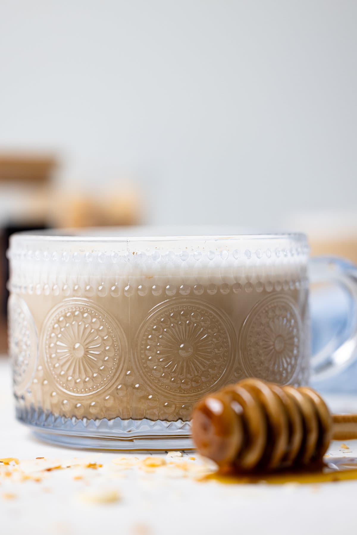 Closeup of a glass of Toasted Coconut Honey Latte 