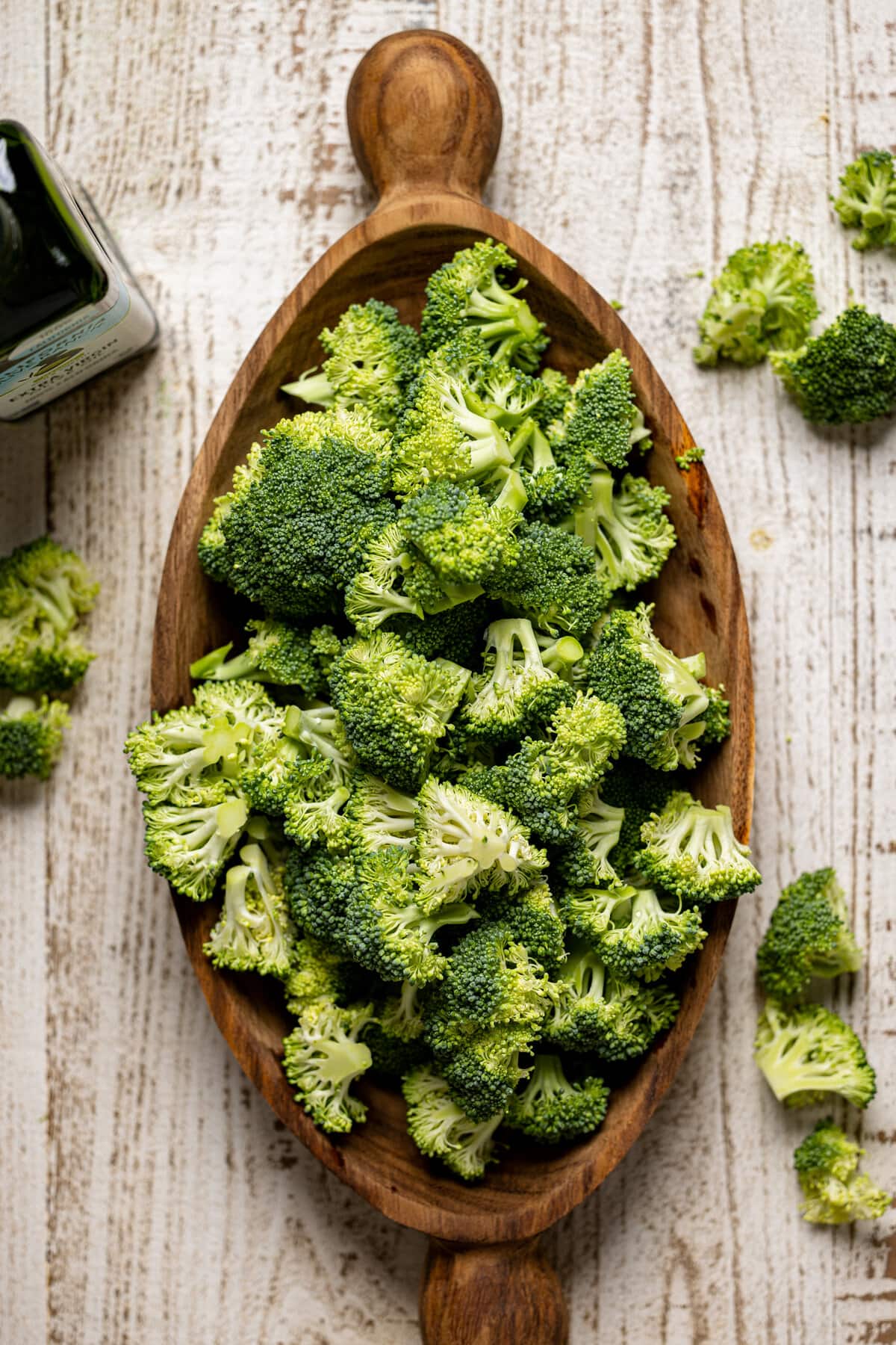 Wooden bowl of chopped broccoli