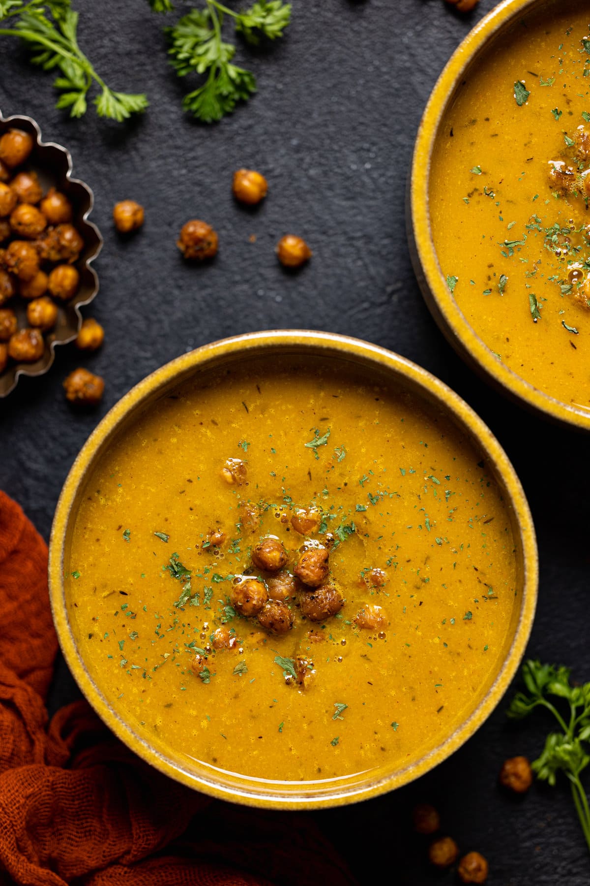 Closeup of a bowl of Spicy Curry Pumpkin Soup with Chickpeas