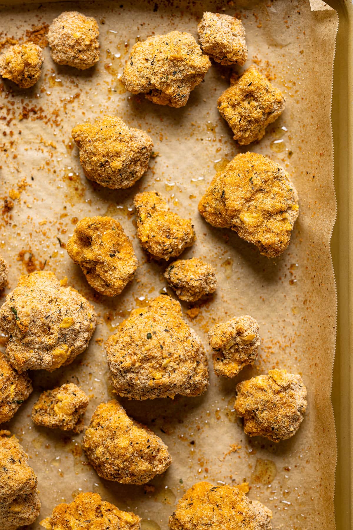 Breaded cauliflower on a baking sheet