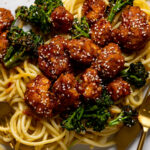 Closeup of Plant-based Sesame ‘Chicken' with Noodles