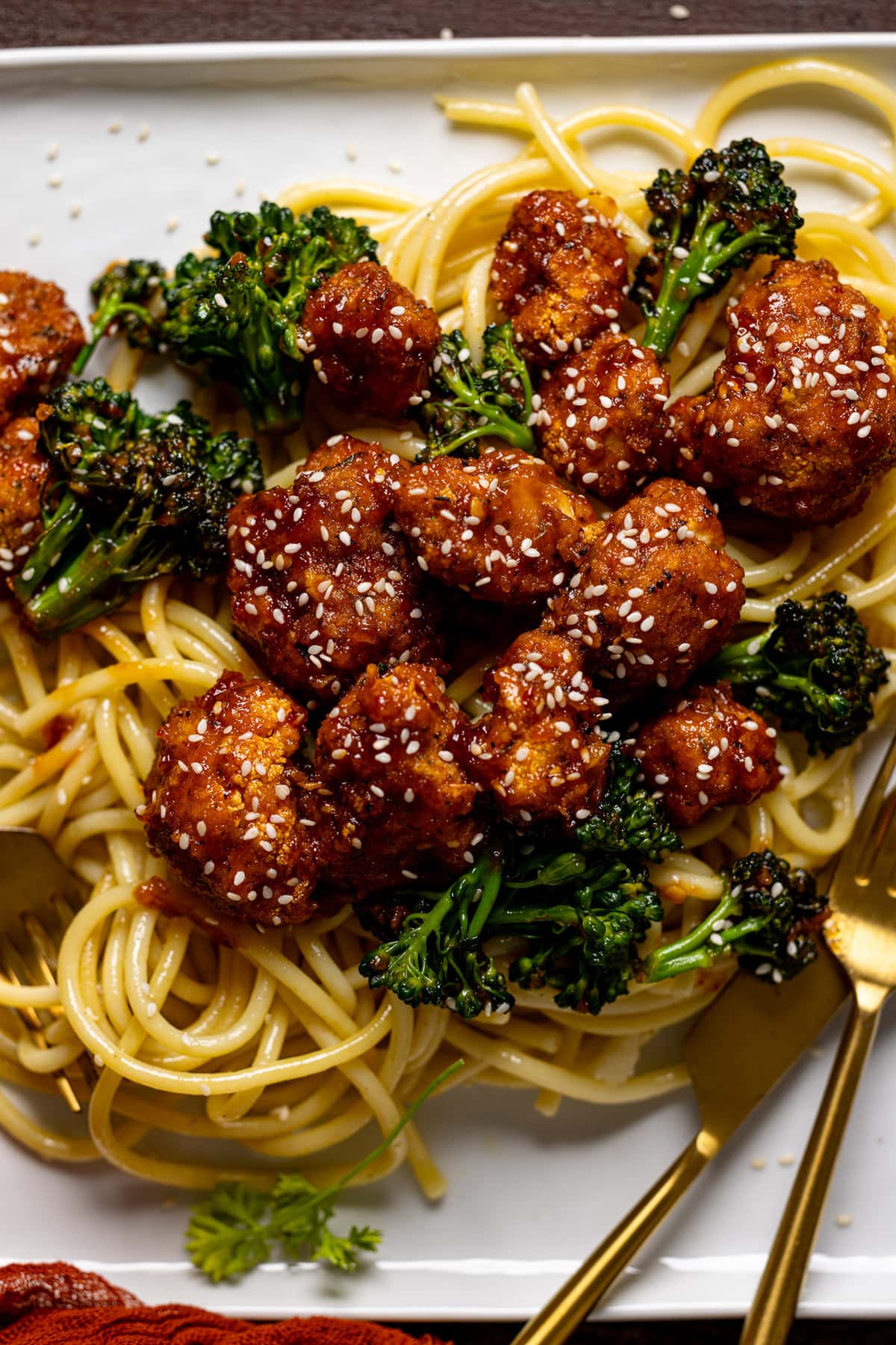 Closeup of Plant-based Sesame ‘Chicken\' with Noodles