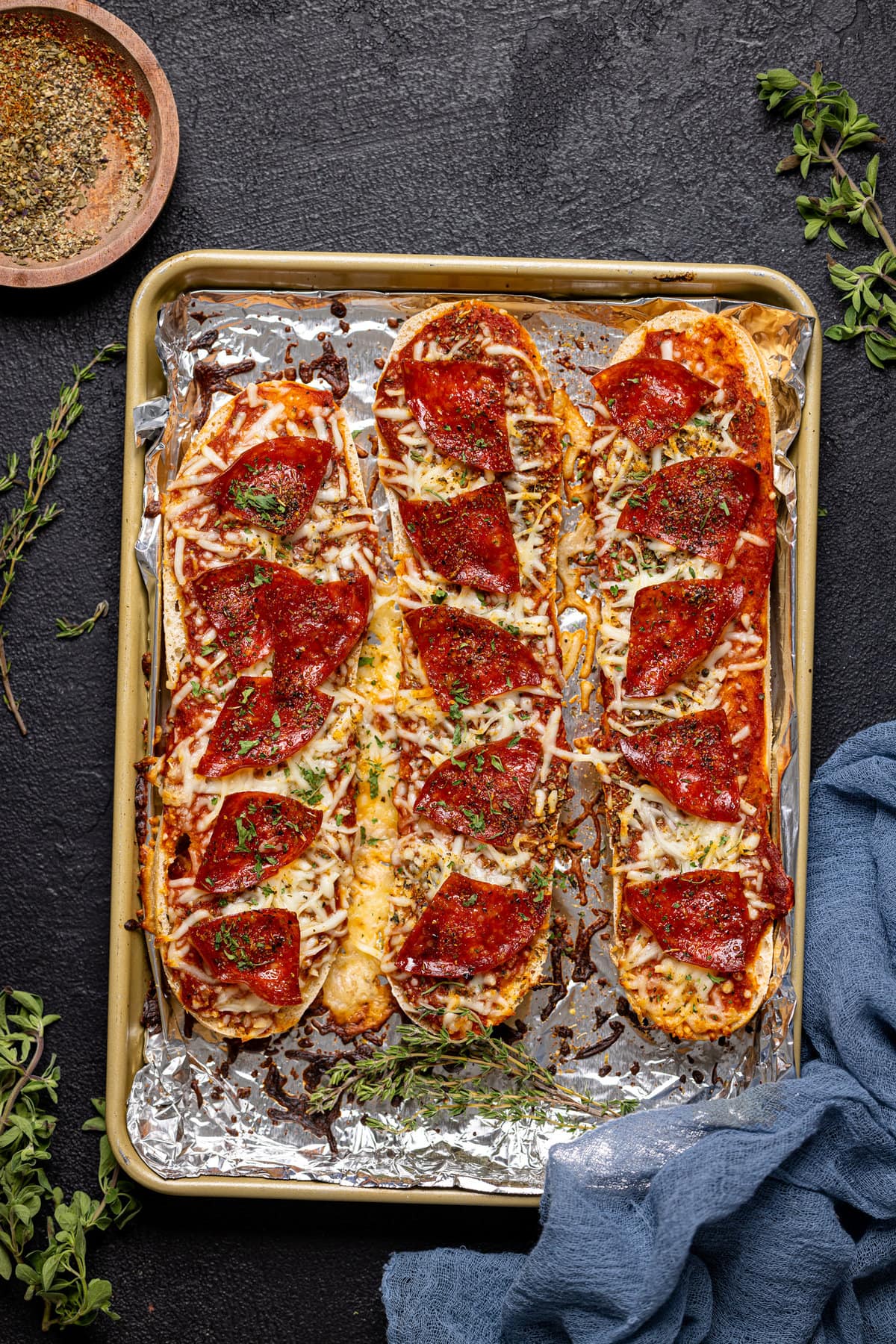 French Bread Pepperoni Pizzas on a baking sheet